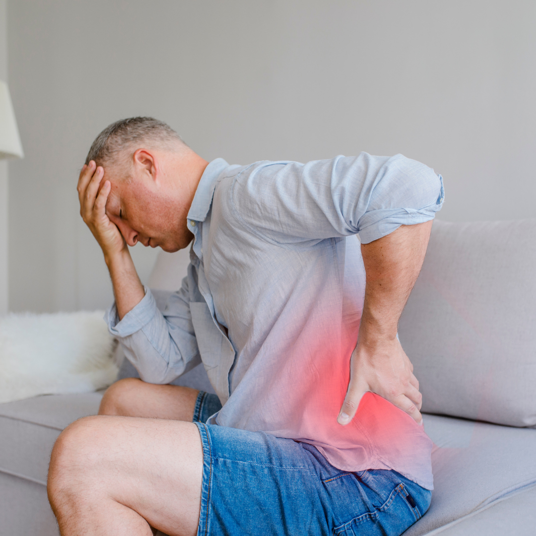 Person experiencing lower back pain