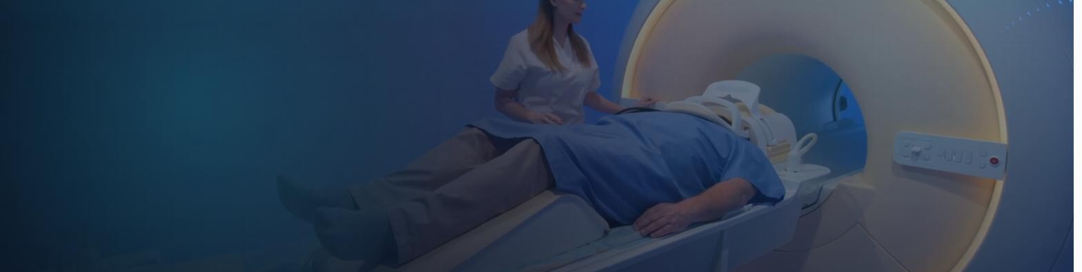 Patient being positioned for a private MRI scan at New Horizons Imaging