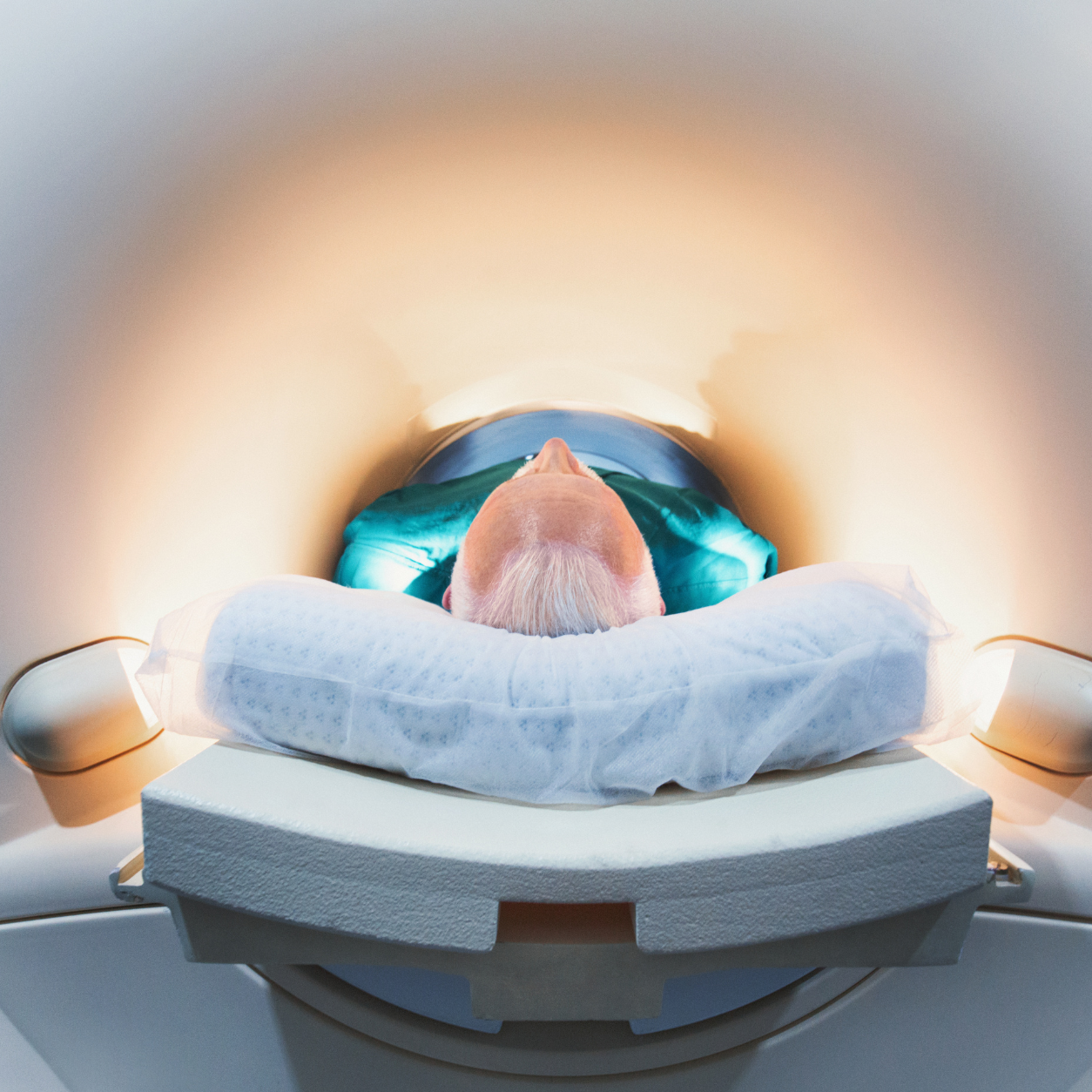 Patient entering an MRI scanner for a head MRI examination